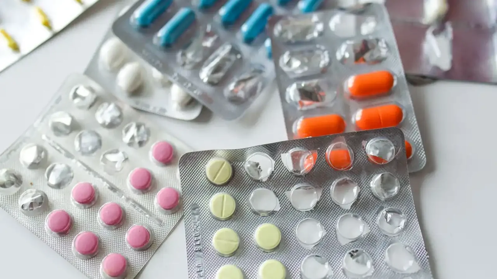 Part-used blister packs of tablets and capsules, of the kind handed over when starting a new medication